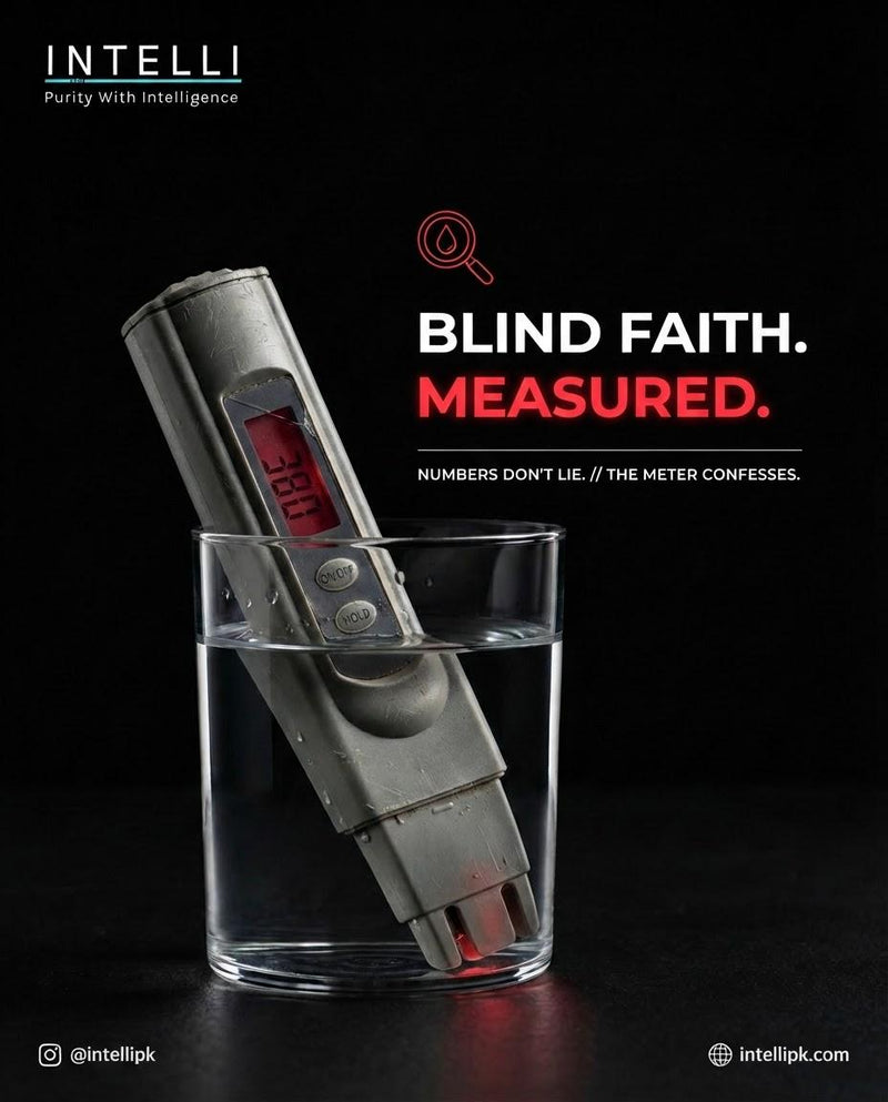 A TDS meter reading dissolved solids in a glass of tap water
